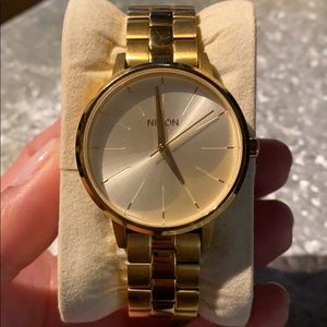 Women’s gold NIXON watch